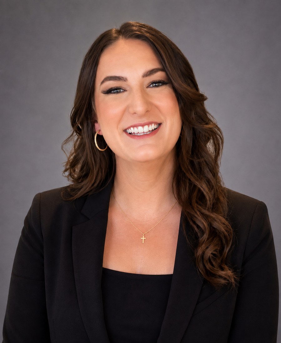 Portrait of Erica McCue, Founding Principal at The McCue Group